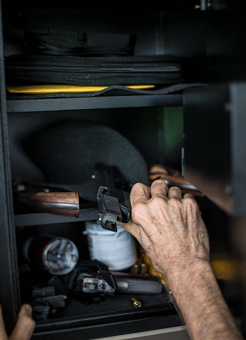 A stock photo of a man using his Home Safe.