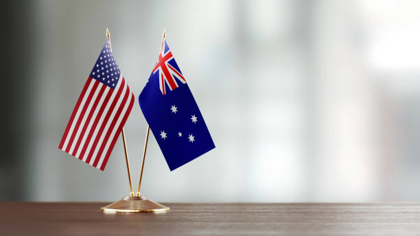 istock American And Australian Flag Pair On A Desk Over Defocused Background 913980576