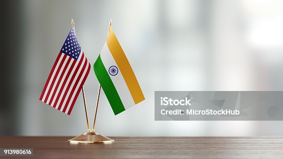istock American And Indian Flag Pair On A Desk Over Defocused Background 913980616