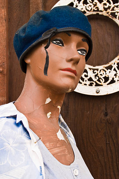 istock Distressed Retail Mannequin, Left Outdoors, Wearing Beret, Female 91399158