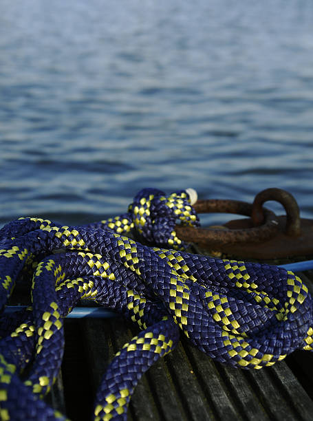 azul metálico - moored nautical equipment circle rope fotografías e imágenes de stock