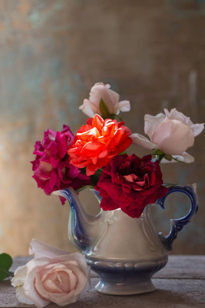 istock still life with rose in old teapot 914000150