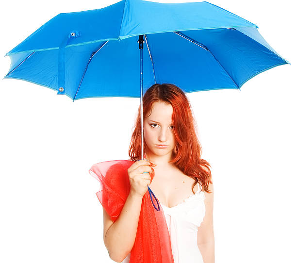 istock The womenl and a dark blue umbrella 91400426