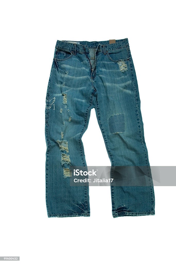 Lacerato strappato, e un paio di Jeans sbiaditi su sfondo bianco - Foto stock royalty-free di Abbigliamento