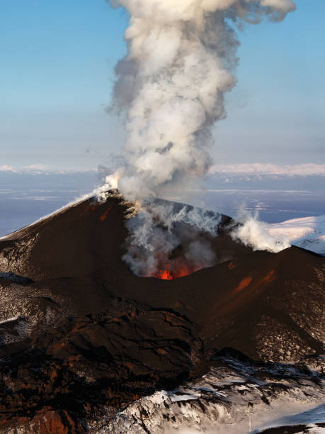 Aerial view of stunning scenery eruption volcano landscape of Kamchatka Peninsula stock photo