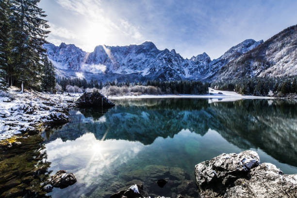 istock first snow at the mountain lake 914008200