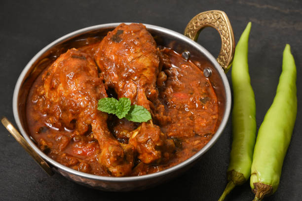 indian dish of spicy hot chicken curry in red - non veg imagens e fotografias de stock