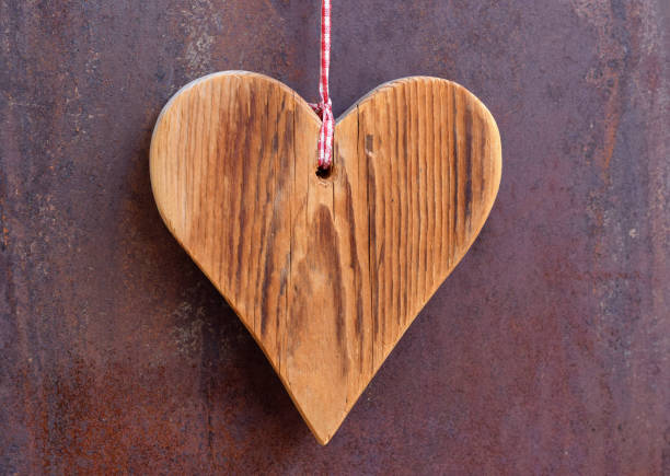 istock Wooden heart on roasted metal surface 914010526
