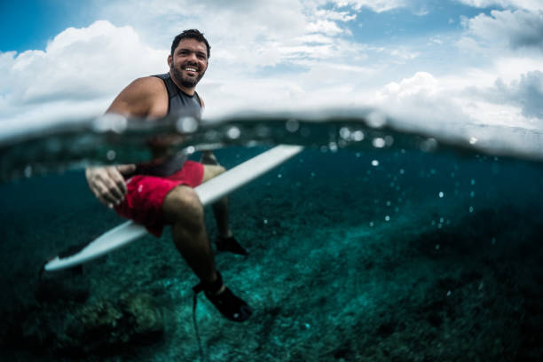 istock Happy surfer waits the wave on line up 914011654