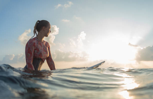 istock Young lady surfer waits the waves 914015056
