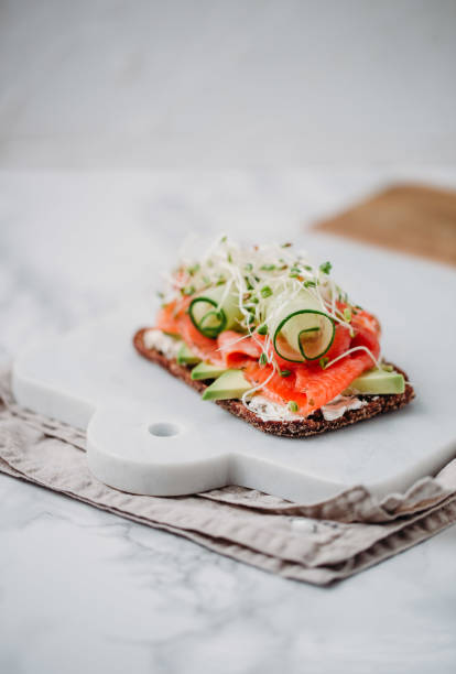 istock Danish open sandwich on ryebread with salmon 914015098