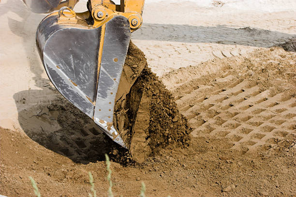 istock Excavators dumping its load of dirt. 91401767