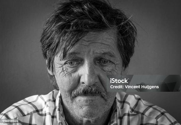 Dramatic And Powerful Black And White Portrait Of A Senior Man With Pale Eyes Looking Away Great Facial Details Perfect For Aging Or Other Old Age Issues Stock Photo - Download Image Now