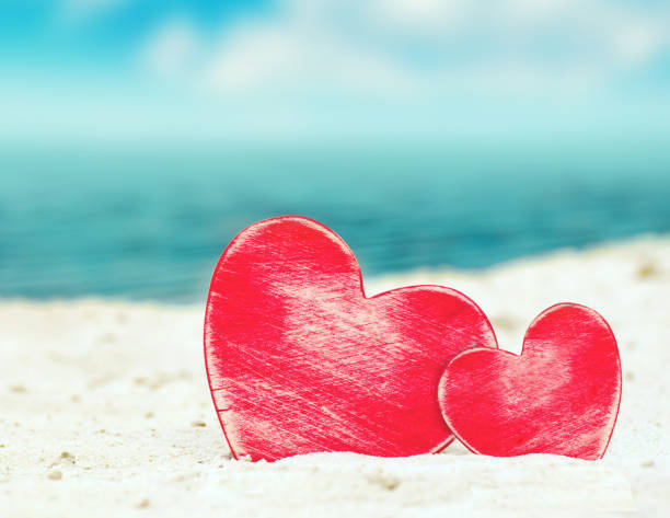 istock Two hearts on the summer beach 914023890
