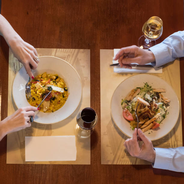 istock A couple enjoying a meal in a restaurant 914031462