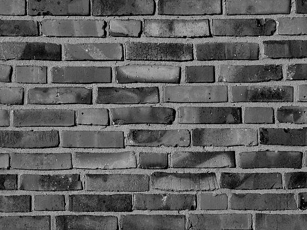 monchrome brick wall stock photo
