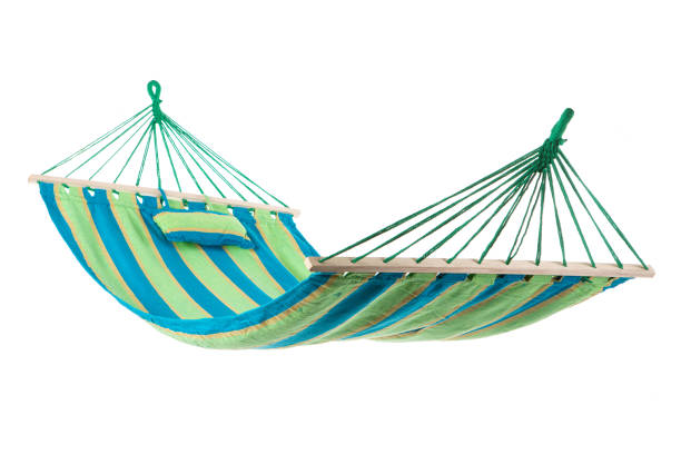 istock a multi-colored hammock made from natural fabric hanging on ropes, white background 914034226