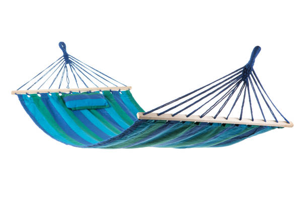 istock a multi-colored hammock made from natural fabric hanging on ropes, white background 914034232