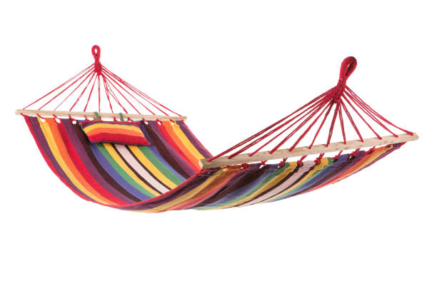 istock a multi-colored hammock made from natural fabric hanging on ropes, white background 914034236