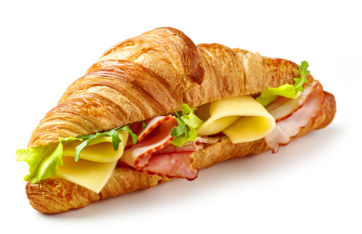 croissant sandwich with ham and cheese isolated on white background