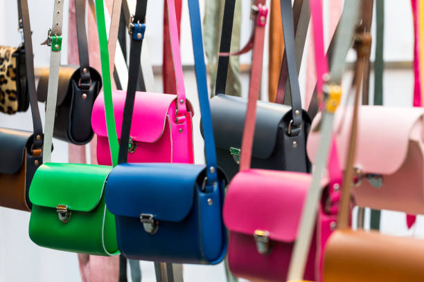 istock Multi coloured handmade leather womens handbags in a row 914034754