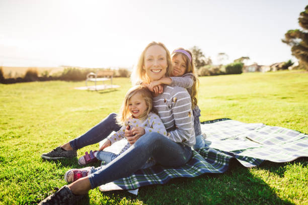 istock happy family have fun in the park 914038040