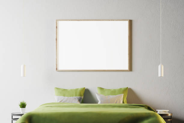 istock White bedroom with green bed and poster 914038784