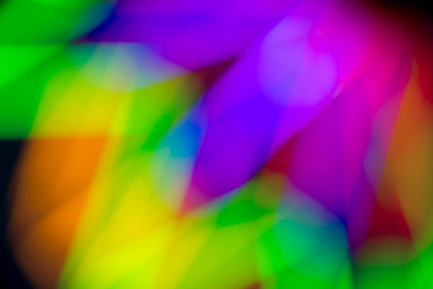 istock Abstract multi color of glow fluorescent on black background 914042096