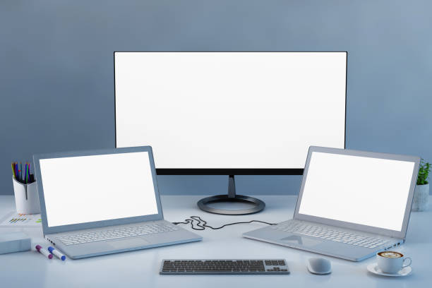 istock Working station with two laptops and large computer monitor 914043406