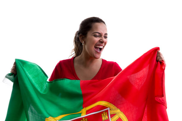 istock Portuguese female fan celebrating on white background 914048746