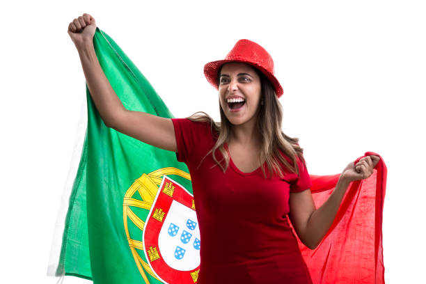 istock Portuguese female fan celebrating on white background 914048766