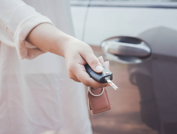 istock Woman with car key 914049360