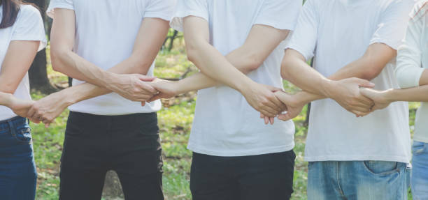 istock Hand of group diversity people volunteer together teamwork 914049616