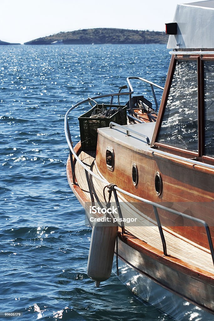 Sailboat anchored at harbor  Anchor - Vessel Part Stock Photo