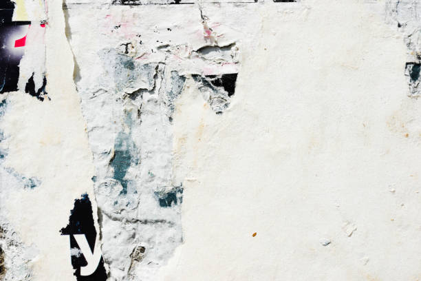 istock Old ripped torn crumpled creased posters grunge textures backgrounds 914053496