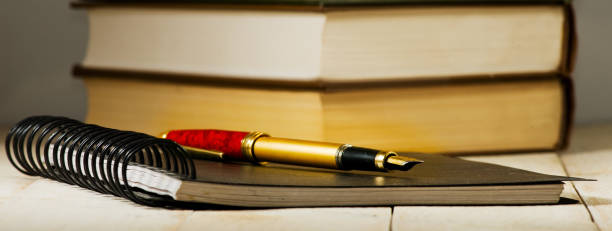 istock Image of books and pens closeup 914057472
