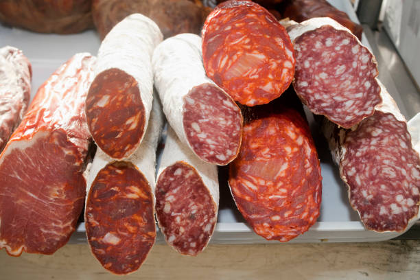 Market display of cold meat pieces, salami, chorizon, salchichon. Galicia, Spain.