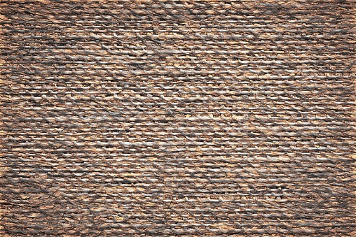 illustration of speckled abstract texture of fabric or textile material of brown color for a background or for desktop wallpaper