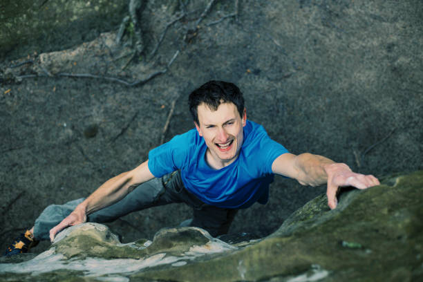 istock Climber to climb a big wall. 914066810