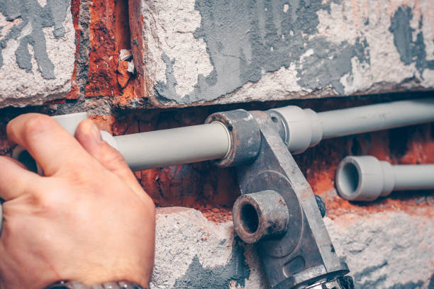 istock The worker performs the connections of polypropylene plumbing pipes 914067362