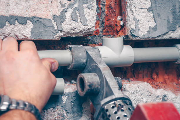 istock The worker performs the connections of polypropylene plumbing pipes 914070462