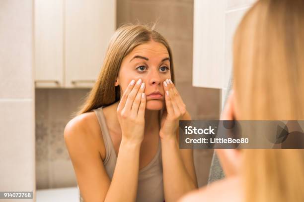 Woman Looking Eye Bags Stock Photo - Download Image Now - Eye, Tired, Women