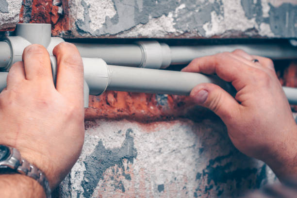 istock The worker performs the connections of polypropylene plumbing pipes 914072980