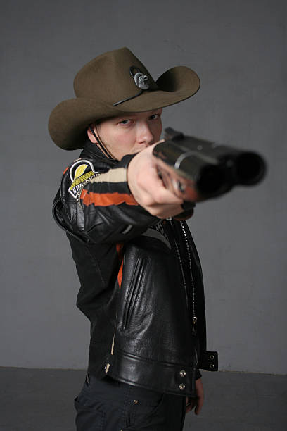 Bah-bah. Cowboy with a double-barreled shotgun