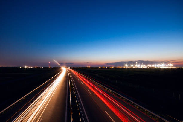 istock Cars speeding on a highway 914081668