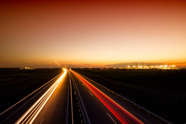 istock Cars speeding on a highway 914083002