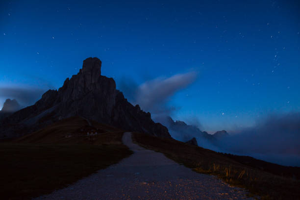 istock Night sky with stars at mountains 914083224