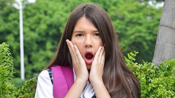 istock Startled Young Colombian Girl Student 914088690