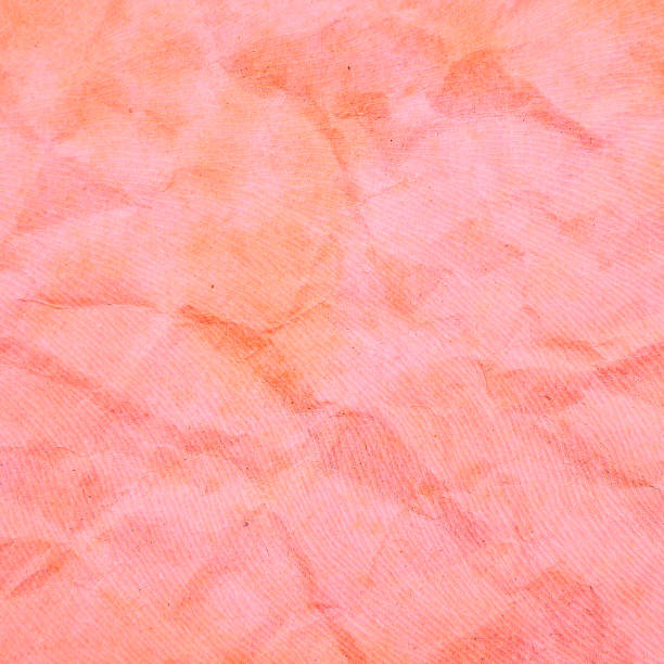 istock Red and orange crumpled paper background 914090992