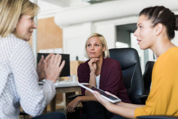 istock Businesswomen having discussion in office 914096840